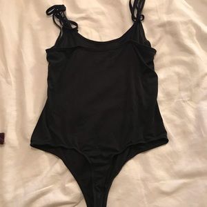 Black Me to We bodysuit
